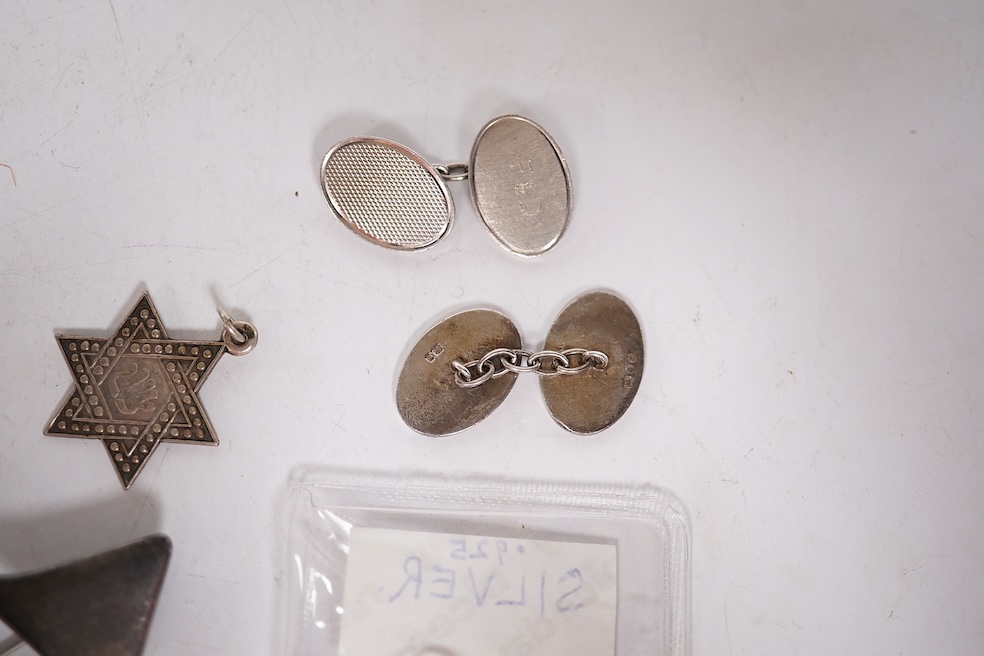An early 1960's Georg Jensen sterling brooch, no. 339 (designed by Henning Koppel, 58mm, together with a small group of jewellery and other items including a pair of silver oval cufflinks, a Persian coin necklace, a 14ct